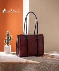 Montana West tool tote bags in black— synthetic leather with floral embossing and tassel