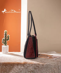 Montana West tool tote bags in black— synthetic leather with floral embossing and tassel