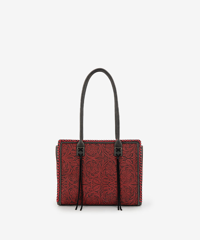 Montana West tool tote bags in black— synthetic leather with floral embossing and tassel