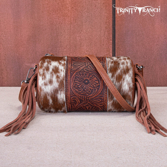 TR159-154  Trinity Ranch Genuine Hair-On Cowhide /Tooled Fringe Collection Barrel Crossbody - Montana West World