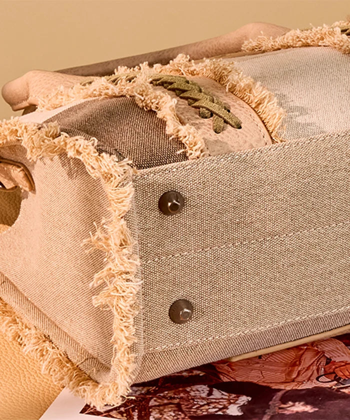 Wrangler canvas tote bag in TN — Rugged canvas with frayed edge and embossed logo