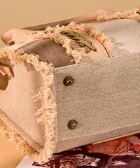 Wrangler canvas tote bag in TN — Rugged canvas with frayed edge and embossed logo