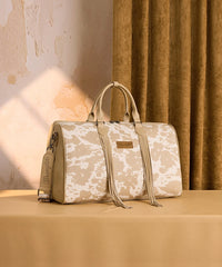Wrangler cow-print weekender duffel bag in TN