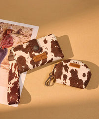 Wrangler cow-print dual pouch wristlet in CF