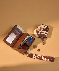 Wrangler cow-print dual pouch wristlet in CF