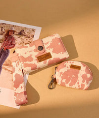 Wrangler cow-print dual pouch wristlet in DPK