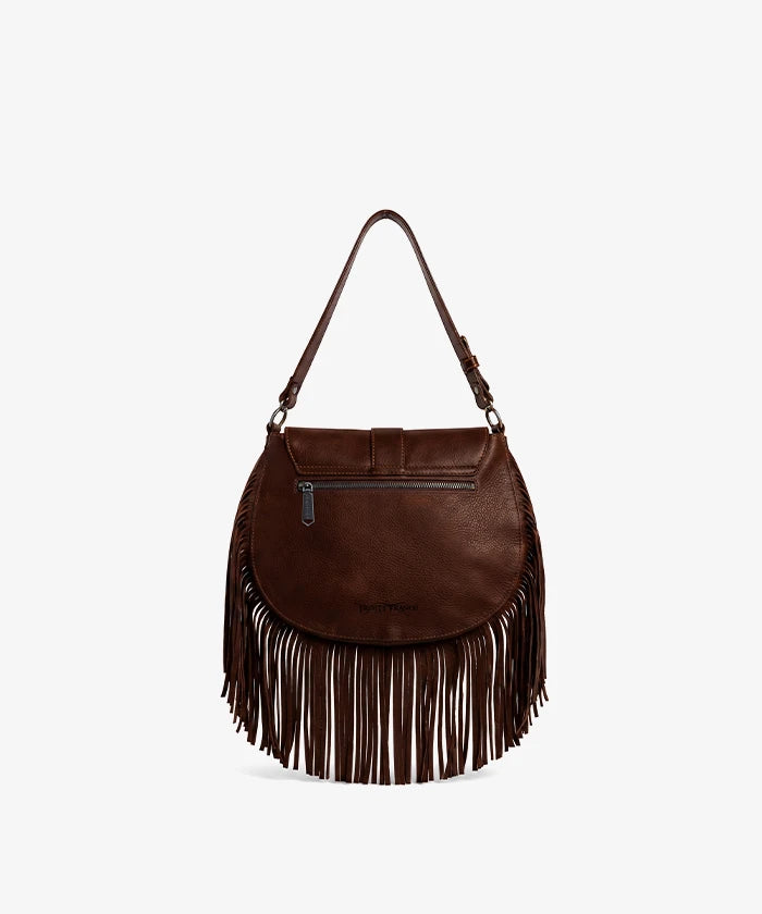 Trinity Ranch Cowhide Saddle Bag — genuine leather with cowhide print and fringe