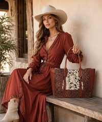 Trinity Ranch Floral Tooled Concealed Carry Tote Purse — Genuine leather with floral tooling and cowhide panel