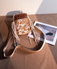 Trinity Ranch Genuine Hair-On Cowhide Tooled Fringe Sling Bag Tan