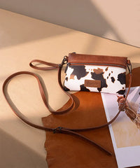 Wrangler Cow-Print Crossbody Clutch in COW-BR