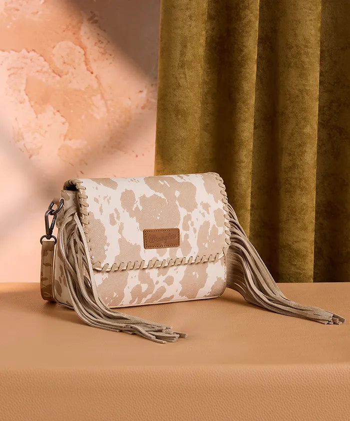 Wrangler cow print flap crossbody bag in DPK
