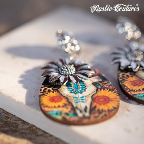 Rustic Couture's Metal Sunflower Wood Painted Bull Skull Dangling Earring - Montana West World